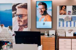 Ottica Dario Bertuletti monitor interno marketing displpay verona
