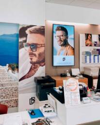 Ottica Dario Bertuletti monitor interno marketing displpay verona